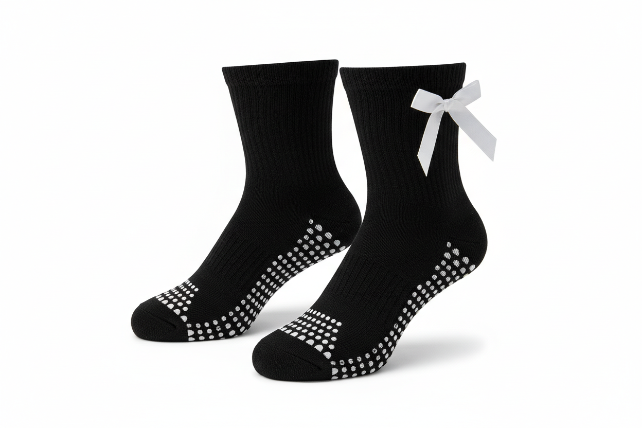 black crew grip socks with white ribbon bow on the side