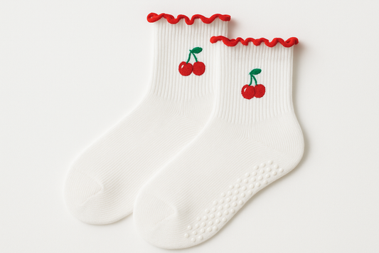 crew grip white socks with red ruffles and cherry logo