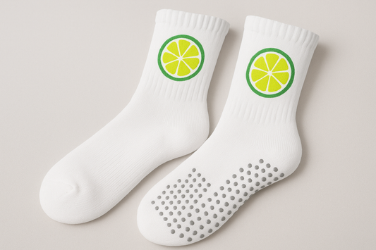 white crew grip socks with lime logo